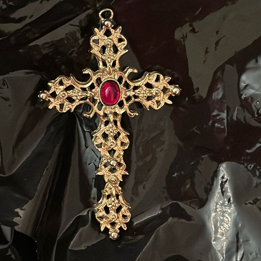AVON vintage 1970s gold tone cross with faux ruby.